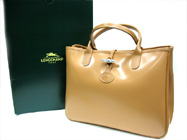 ]T`lobOMCAM@[@V@LONGCHAMP@]